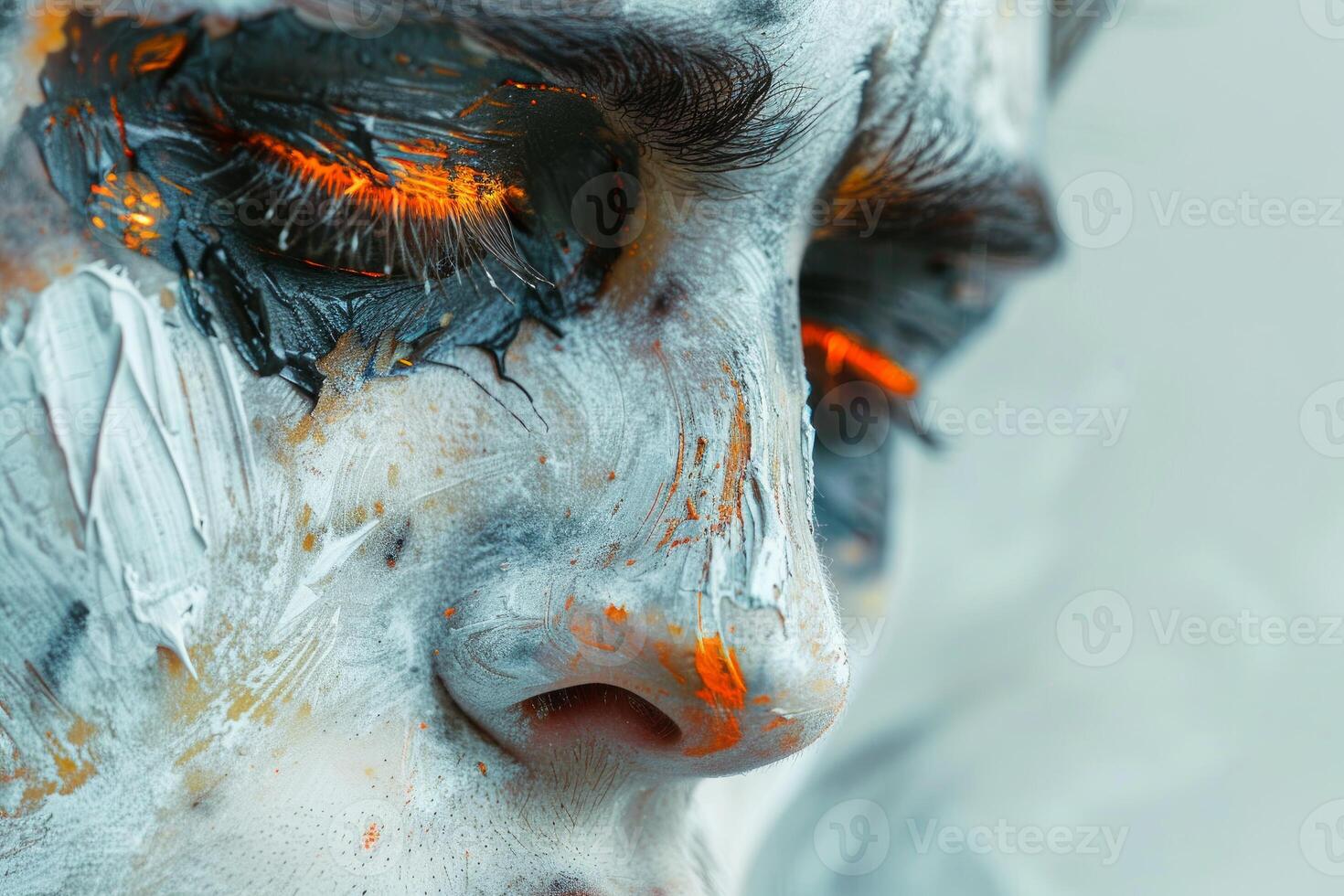 Abstract artistic makeup with textured paint on face photo
