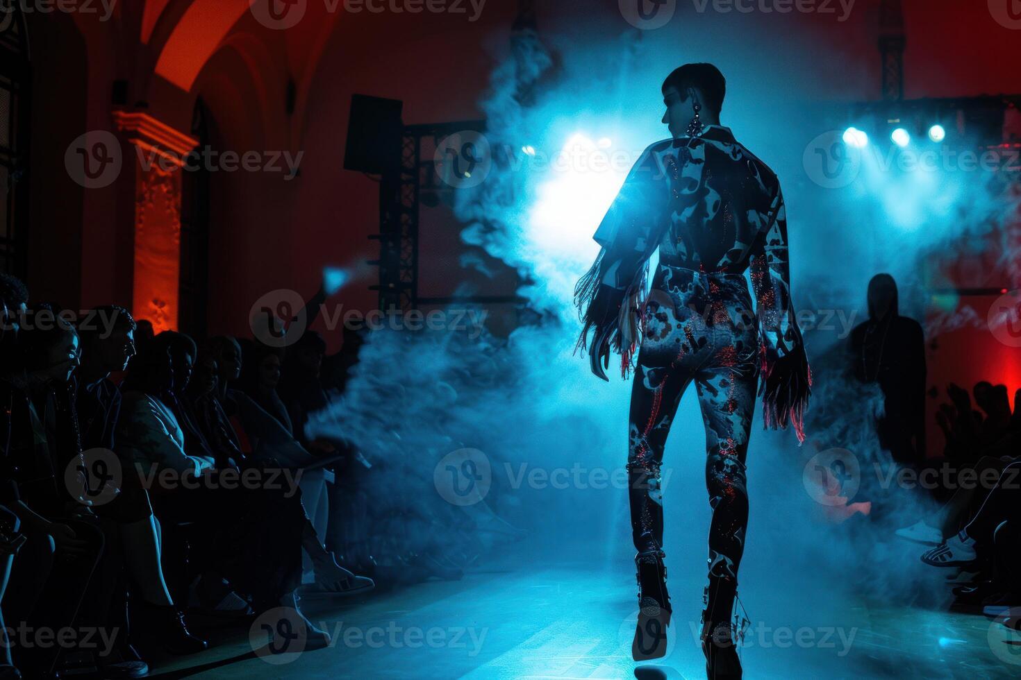 Fashion show finale walk with model on runway photo