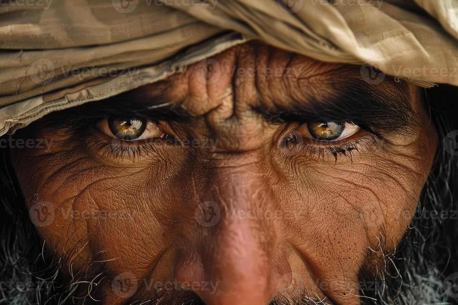 Intense gaze, closeup portrait of a man with wrinkled face photo
