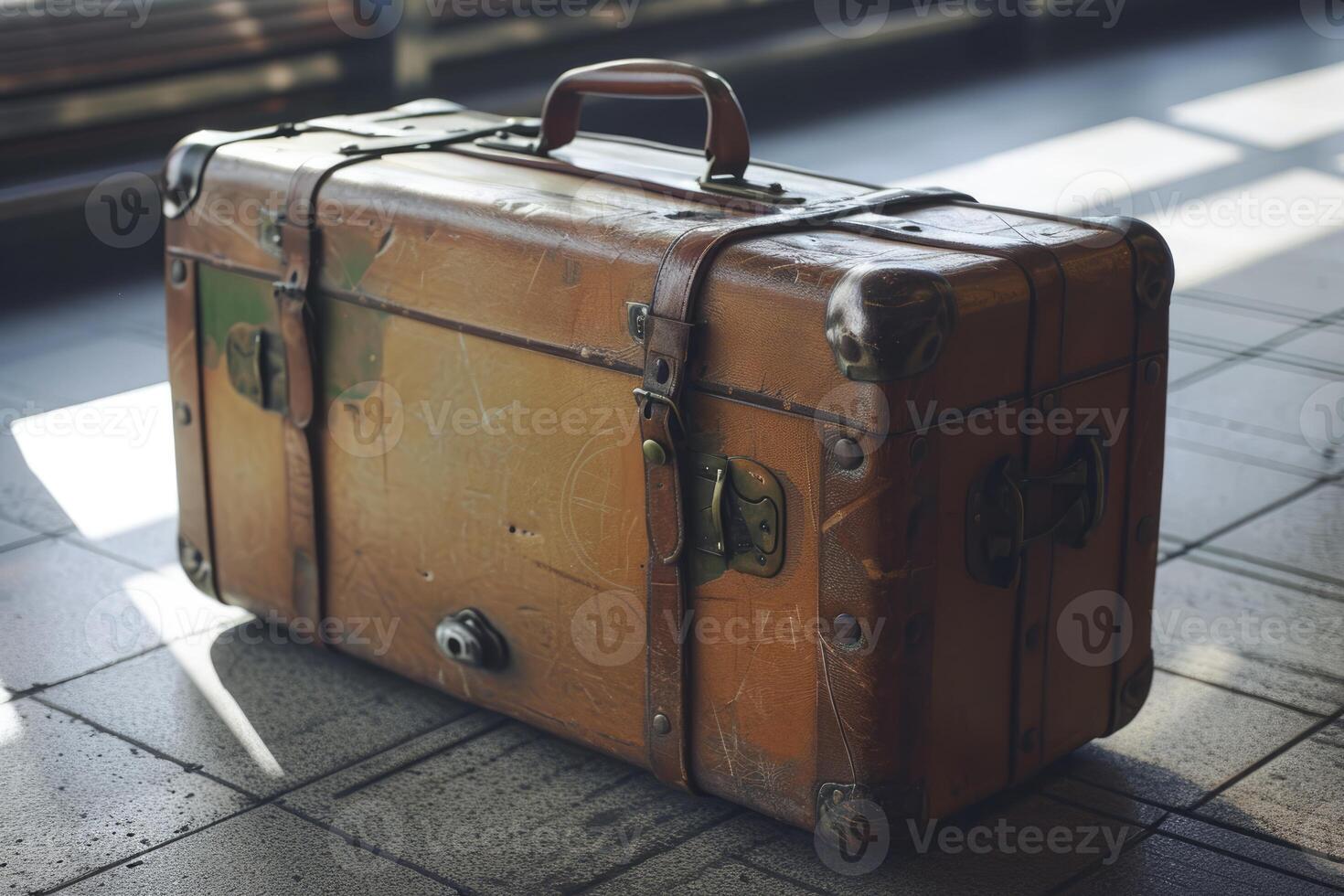 Vintage leather suitcase on station platform photo