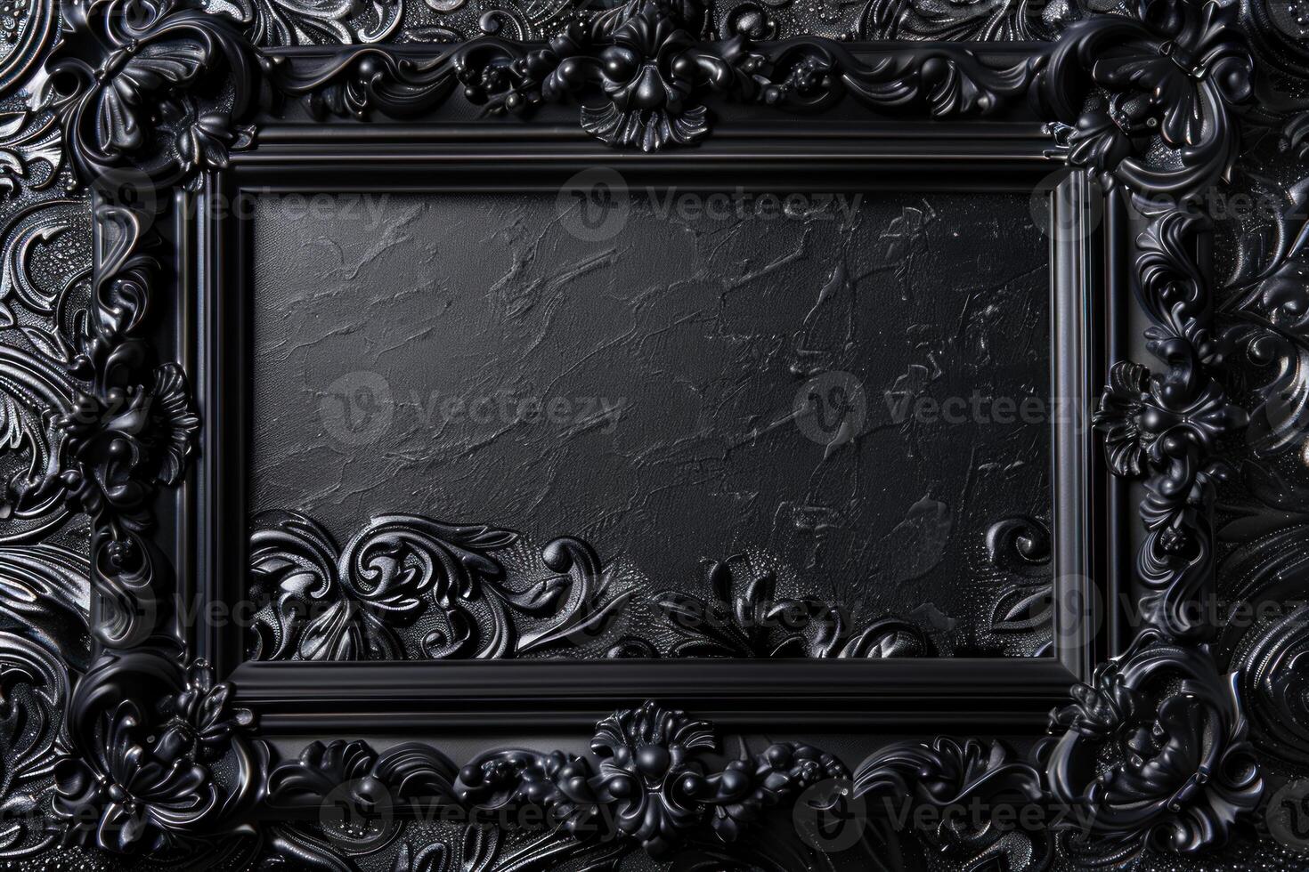 Black ornate picture frame with blank rough textured background with copy space photo