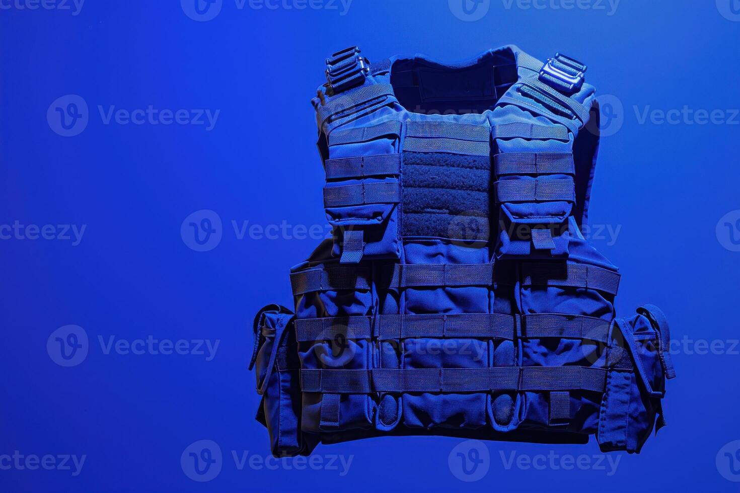 Modern blue bulletproof vest floating on a blue background photo