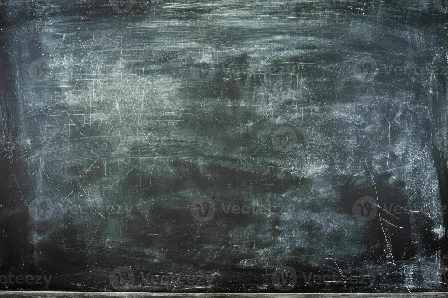 Empty blackboard with chalk dust texture showing concept of education photo