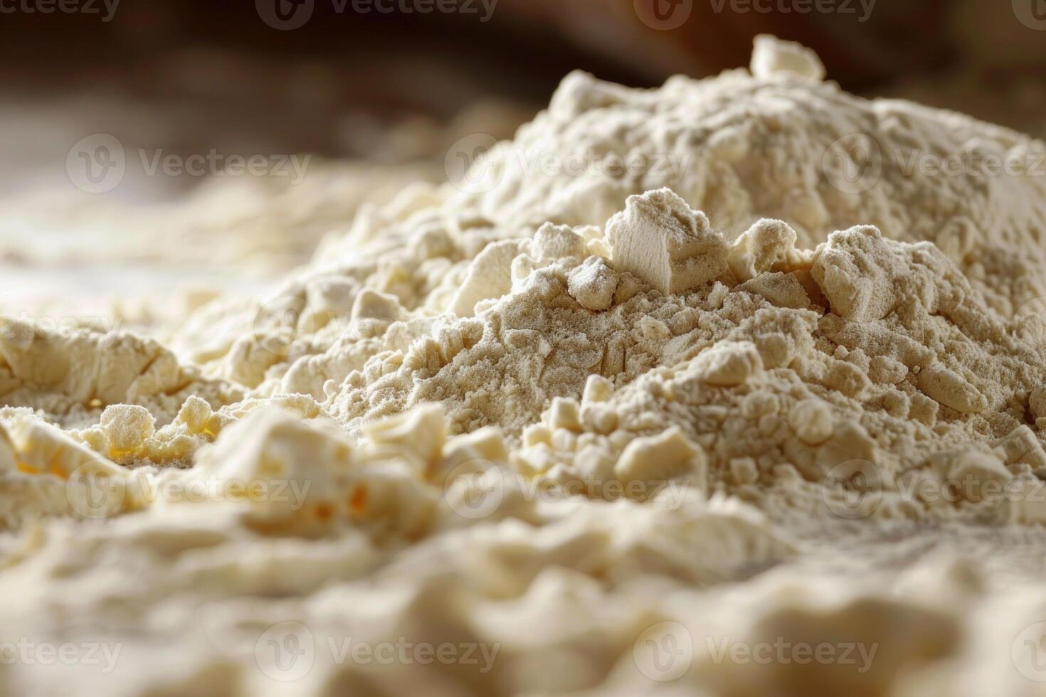 Closeup of flour forming a small mountain range photo