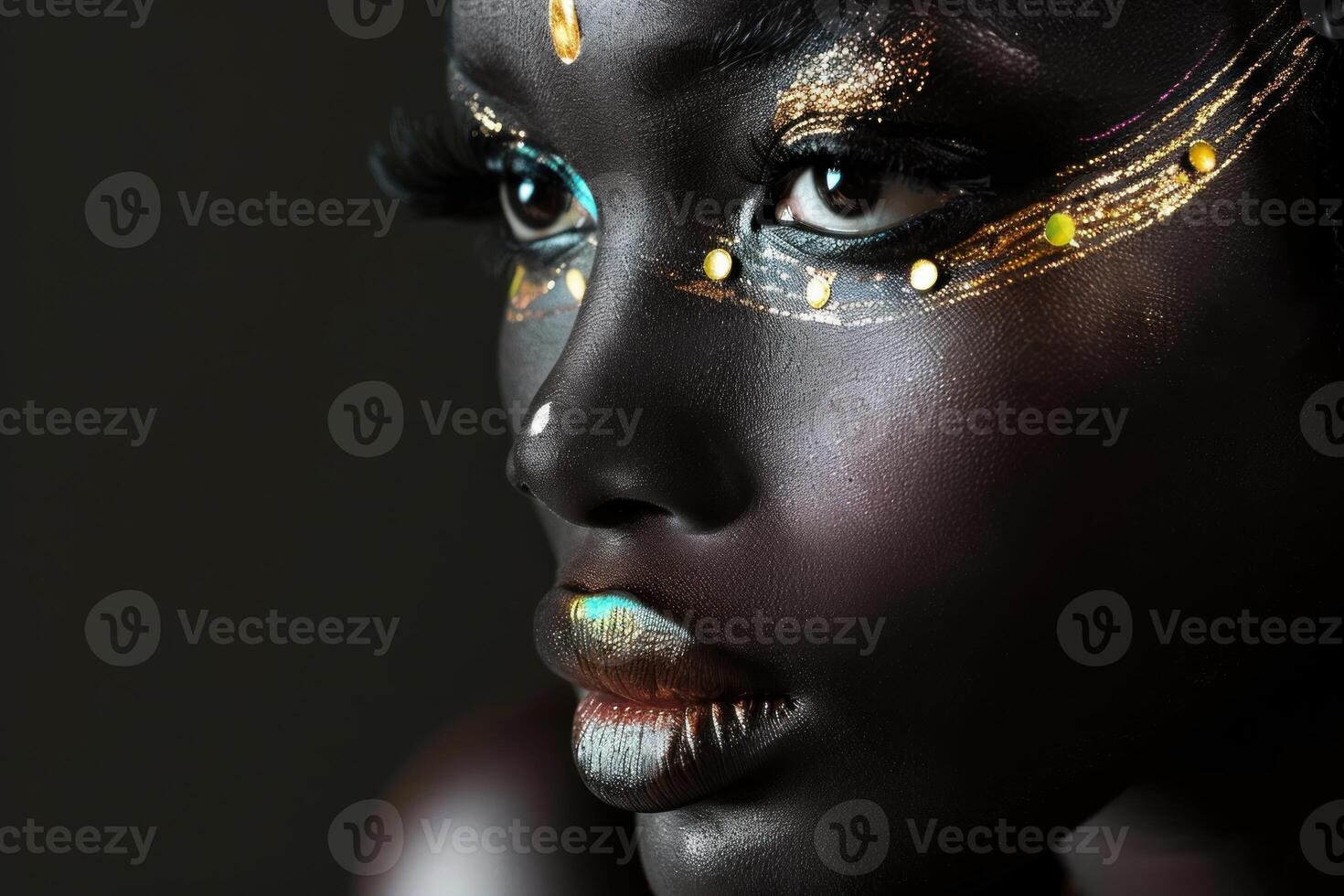 Fashion model posing with creative golden makeup and black skin photo