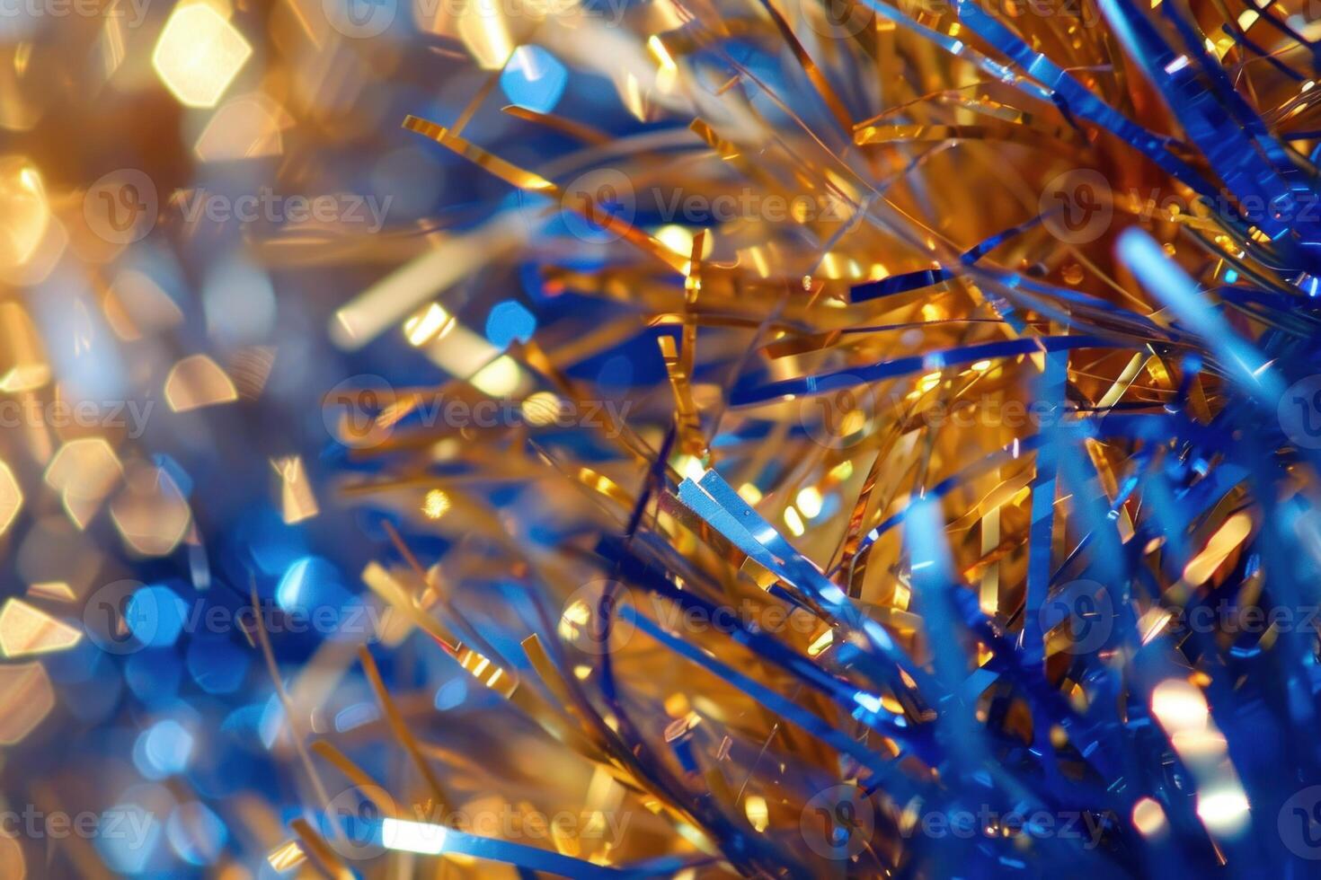 Abstract blue and gold christmas tinsel background with sparkling lights photo