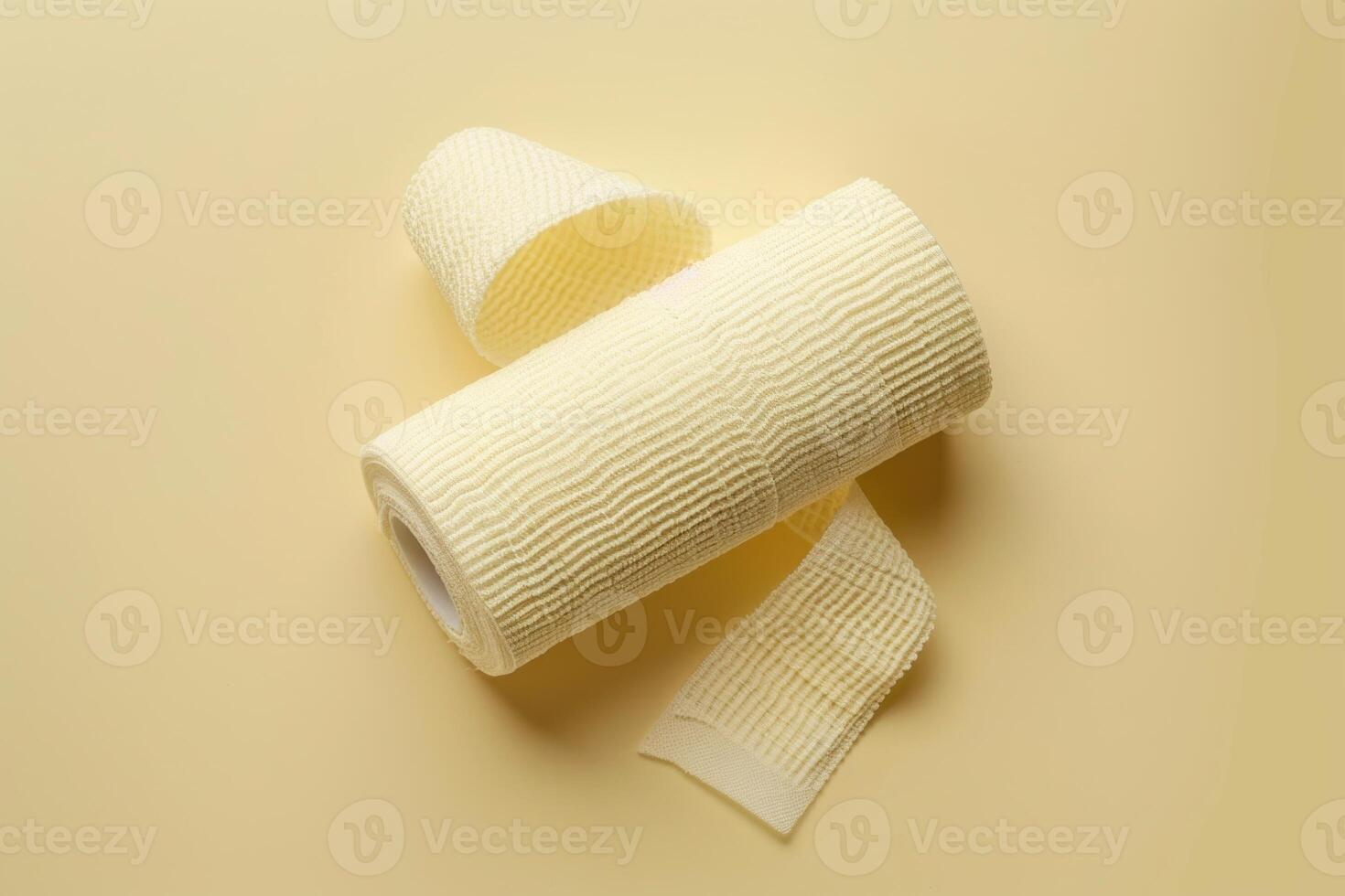 Elastic medical bandage lying on background photo