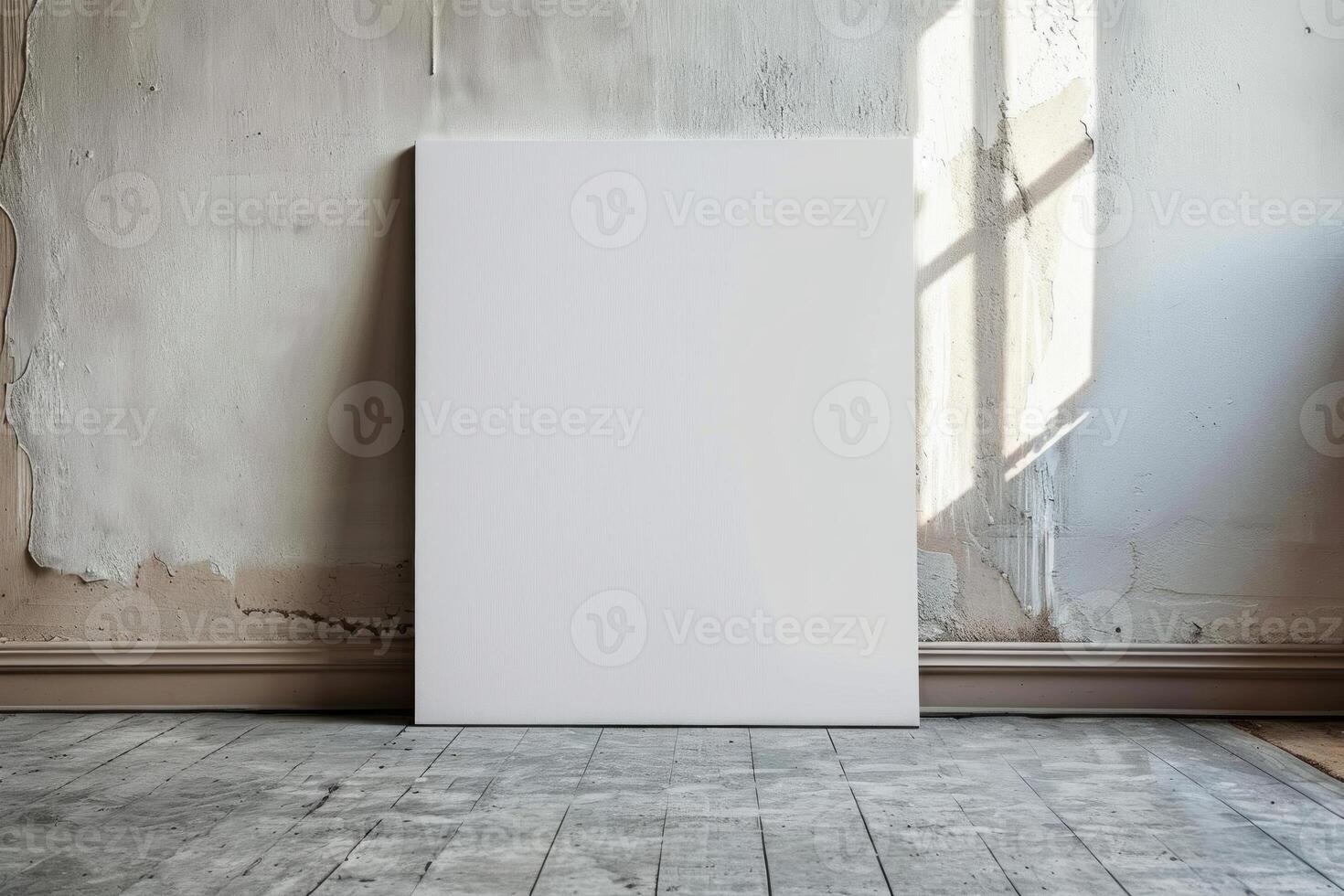 White blank canvas standing by the old wall in empty room photo