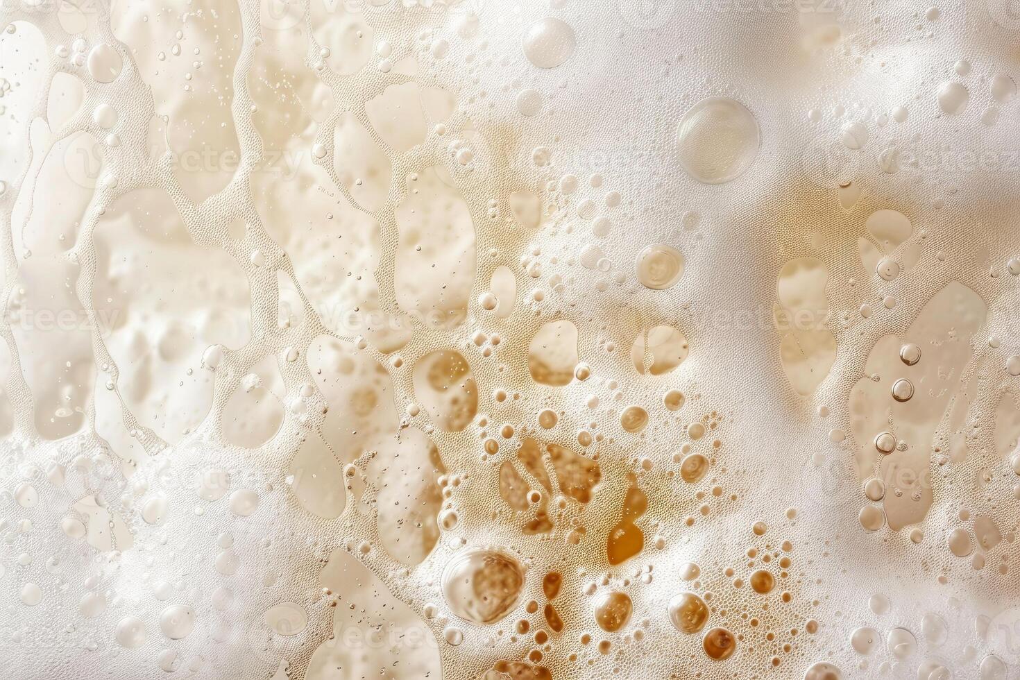 Golden beer bubbles creating a bubbly texture photo