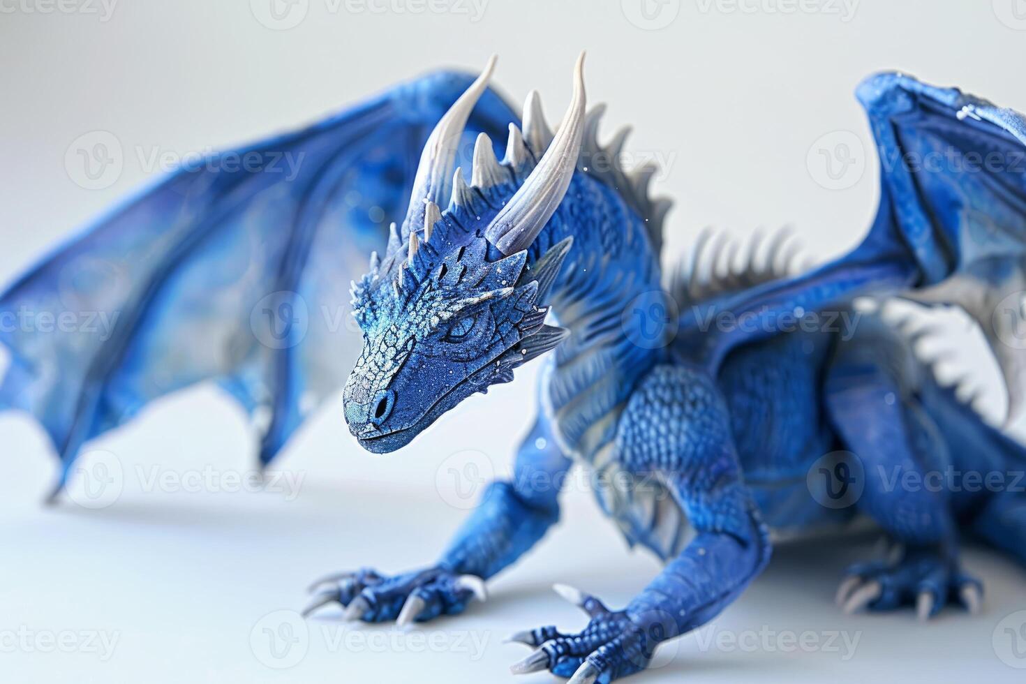 Beautiful blue ice dragon spreading its wings photo