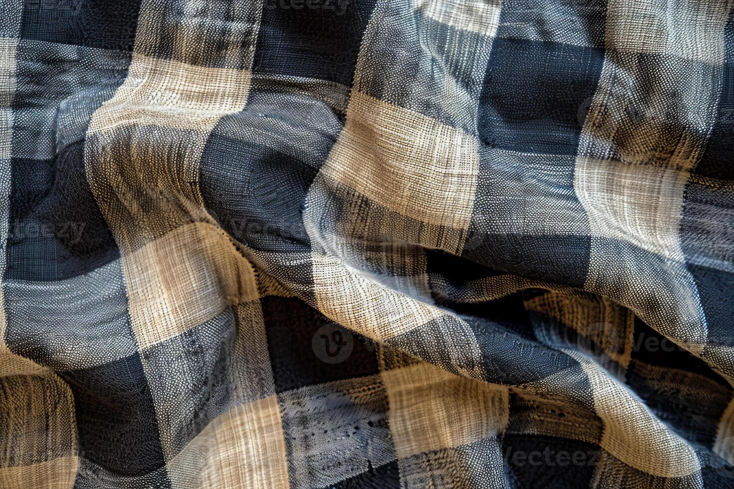 Black and white checkered fabric folded showing texture and pattern photo