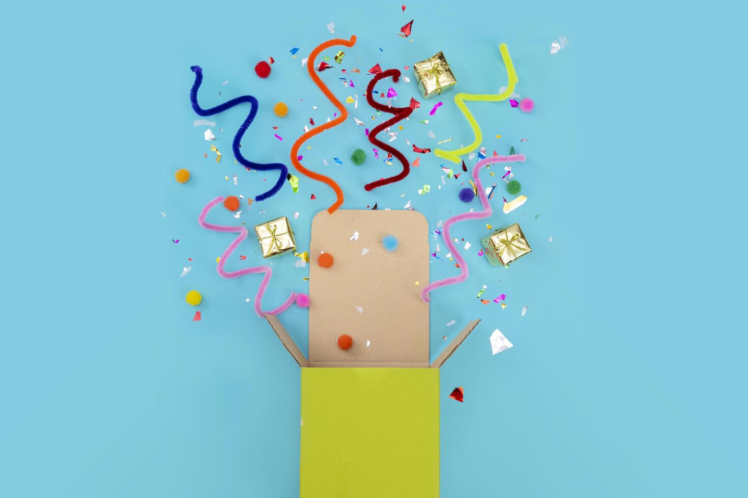a green gift box that opens, celebrating success photo