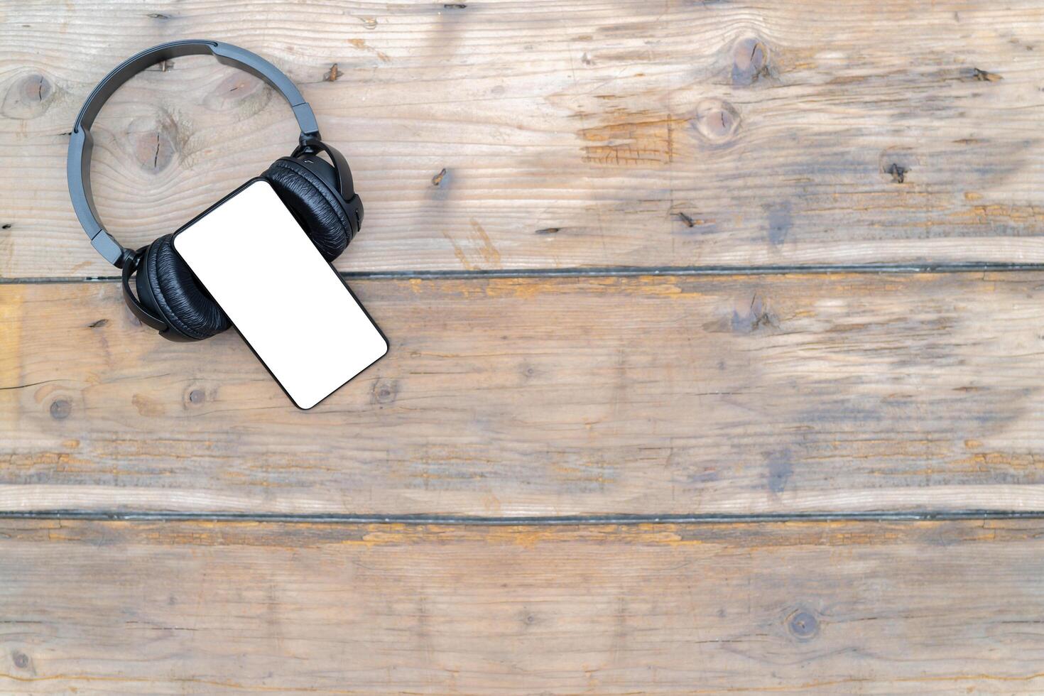 A smartphone with headphones photo