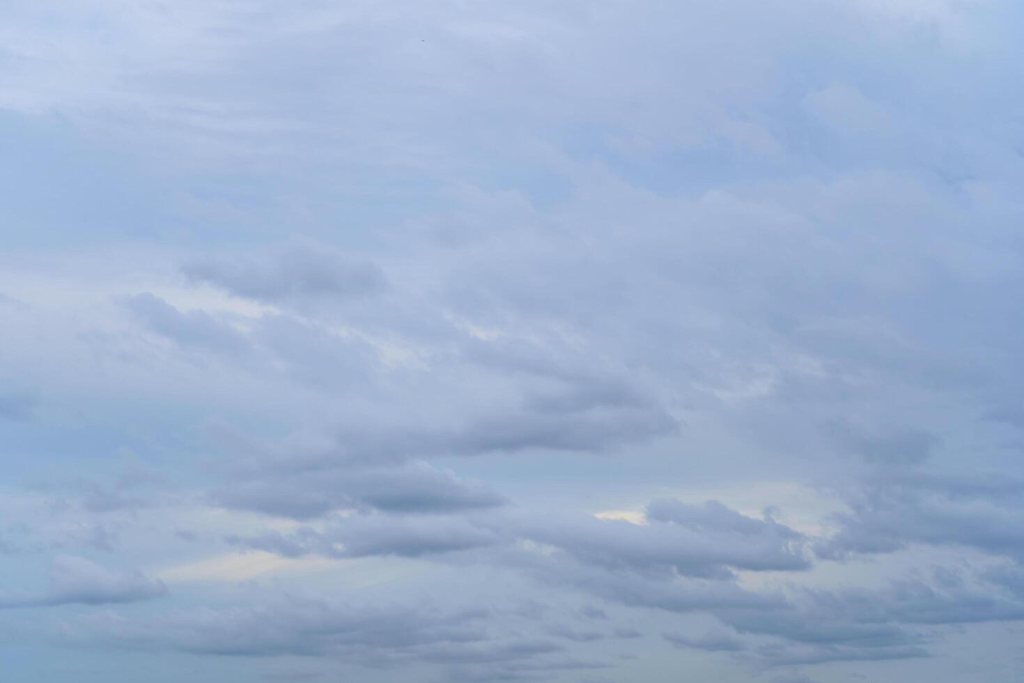 The sky is full of clouds floating around photo