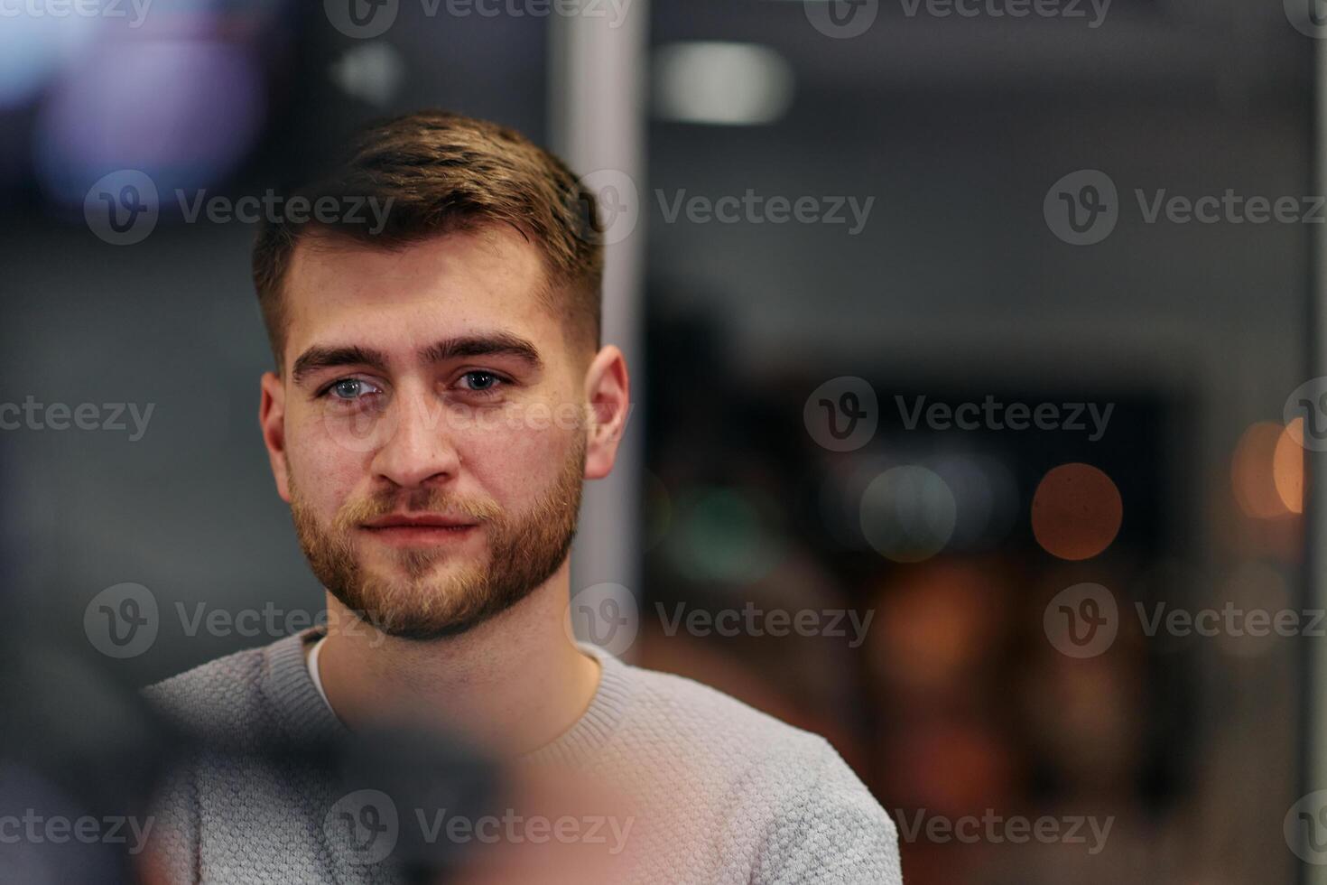 Close-up European Businessman Engaging with Colleagues in Office Discussion photo