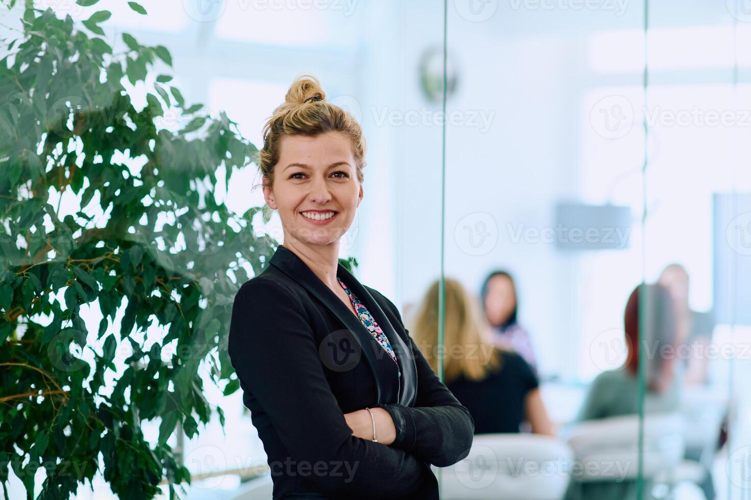 Radiant Businesswoman. A Vibrant Presence in the Company Corridor photo