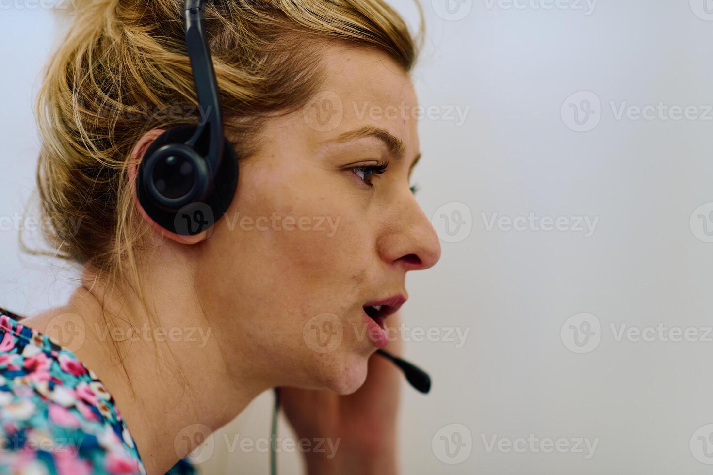 Female Call Center Agent Providing Customer Support and Assistance. photo