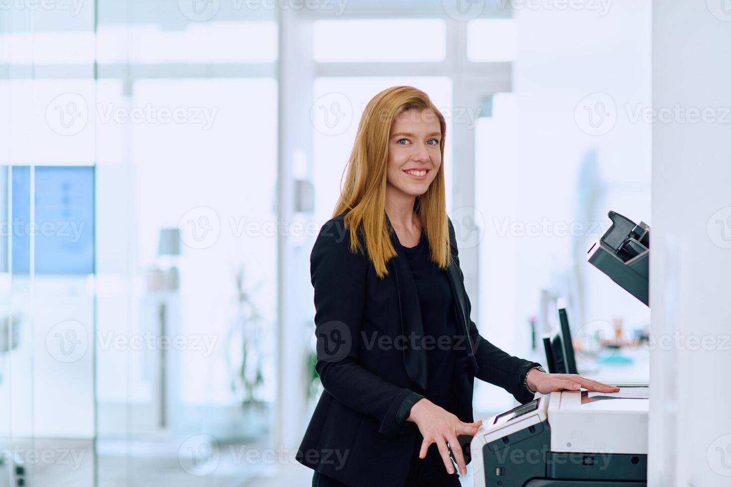 Blonde Businesswoman Using Printer in Office Setting. photo