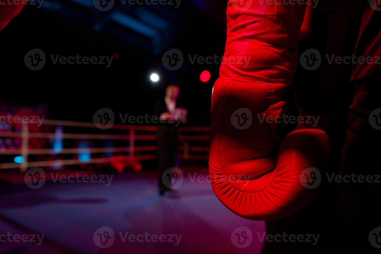 Boxing glove in corner symbolizes the readiness and determination of a fighter. photo