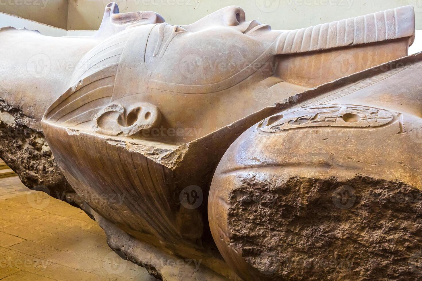 Giant statue of Ramesses II in the Mit Rahina Museum in Memphis. photo
