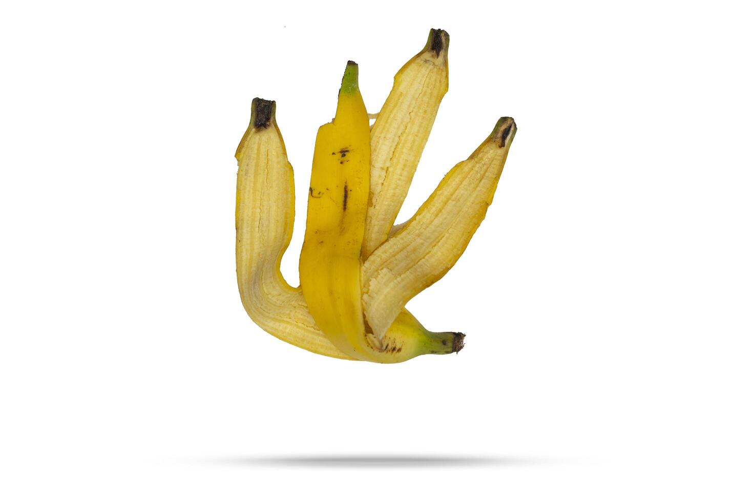 Banana isolated on white background. Banana peel concept photo