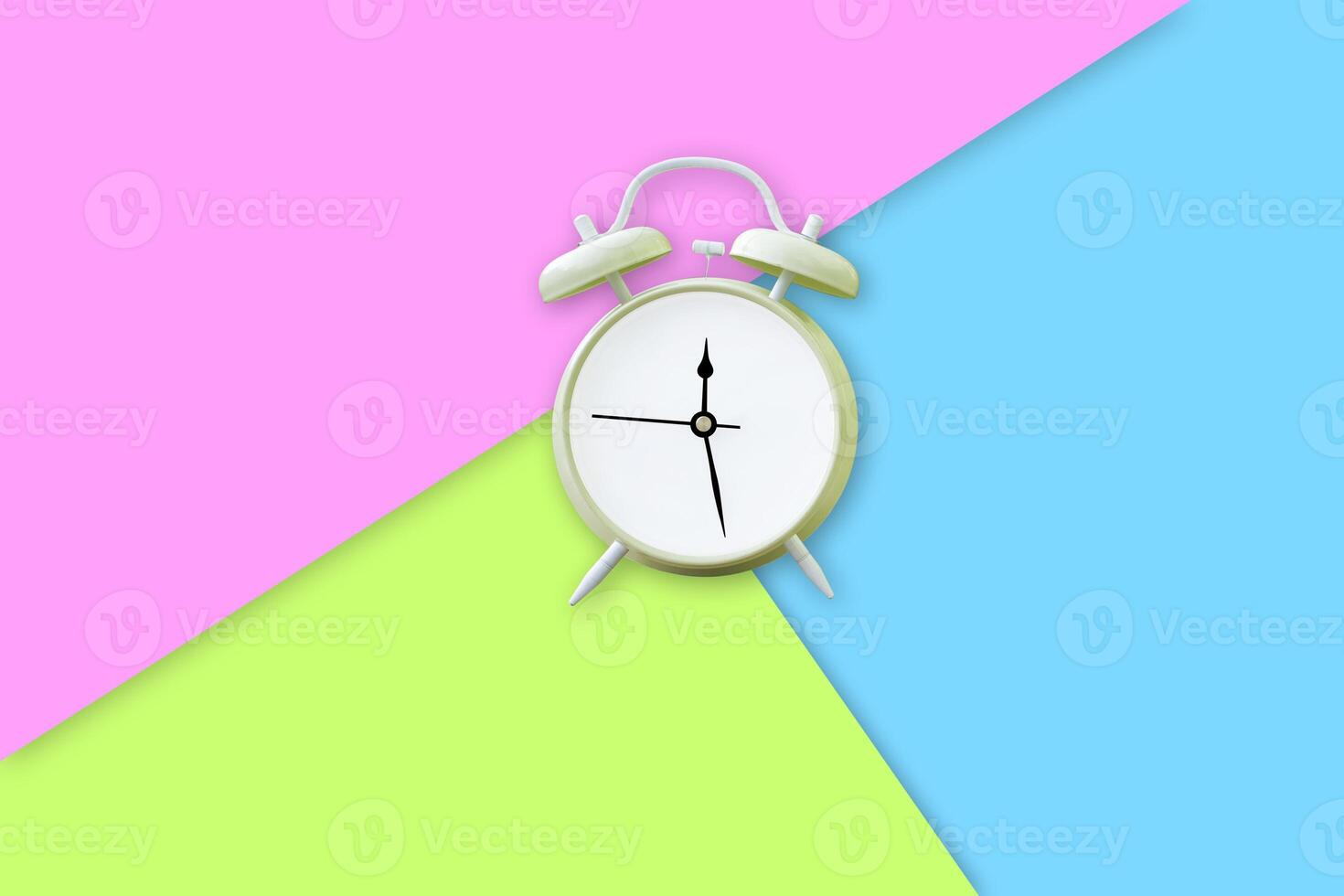 The green alarm clock is placed. photo