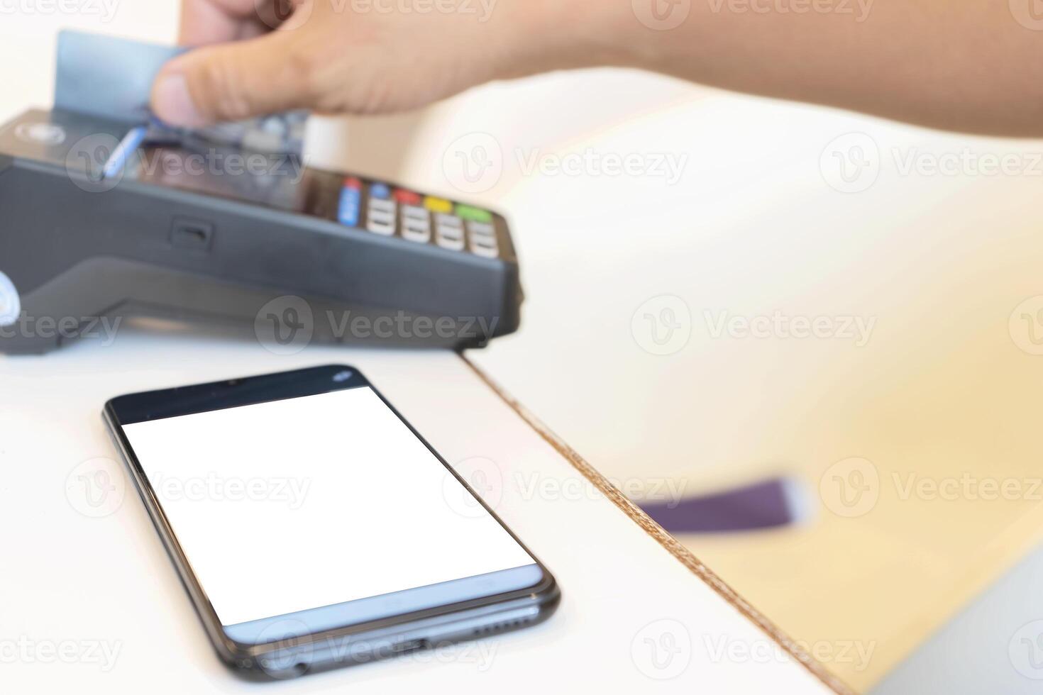 Hand Swiping Credit Card. photo