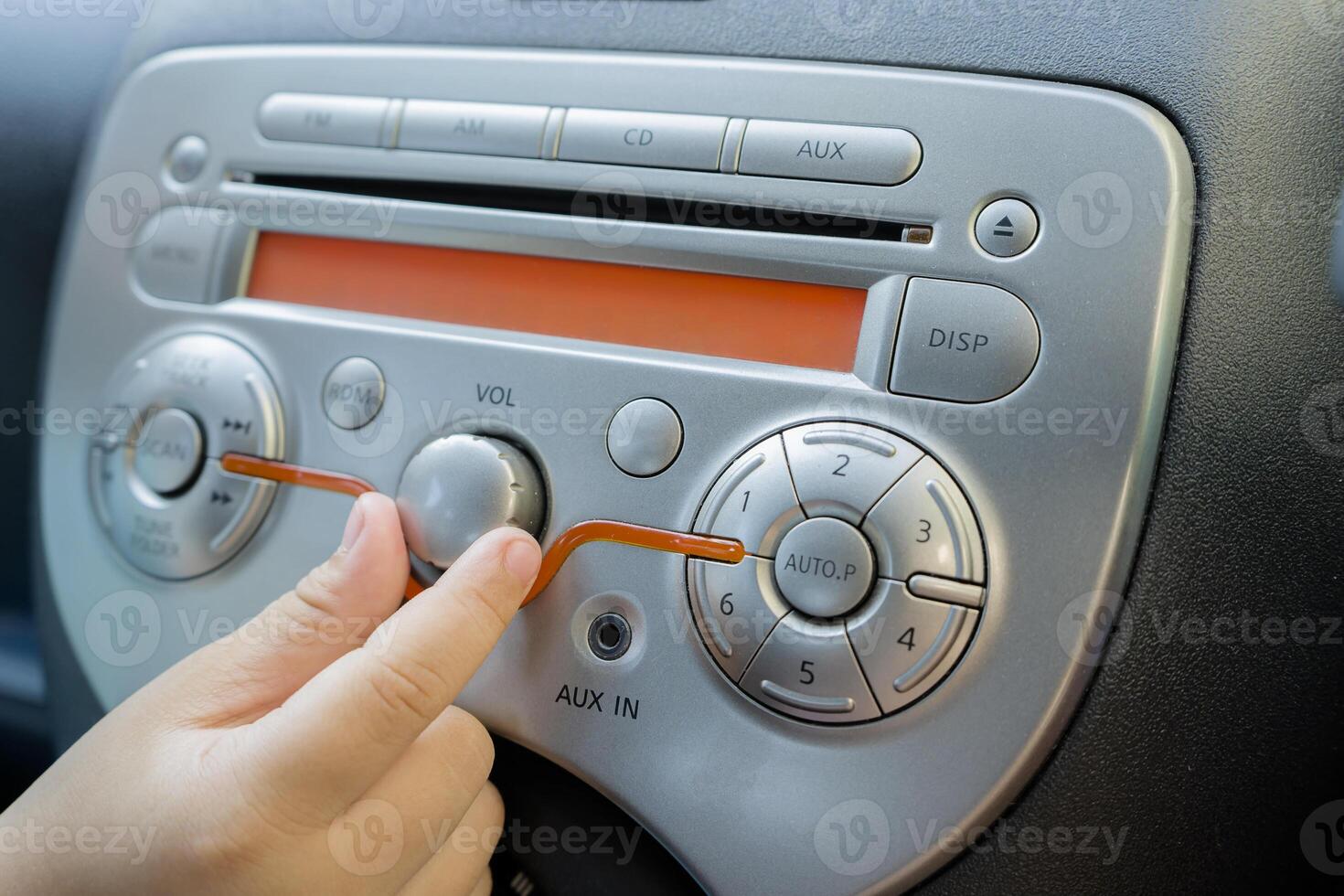 Car audio system concept. Music player in car. photo