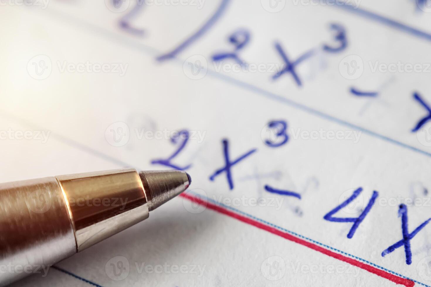 Math problem solving,Must use computational skills. The pen is placed on paper. photo