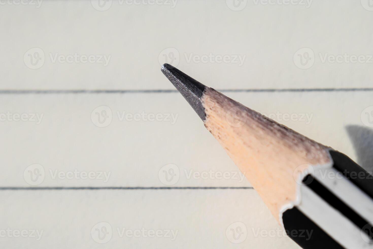 Close up of pencil on paper. Copy space,Enter the media message. photo