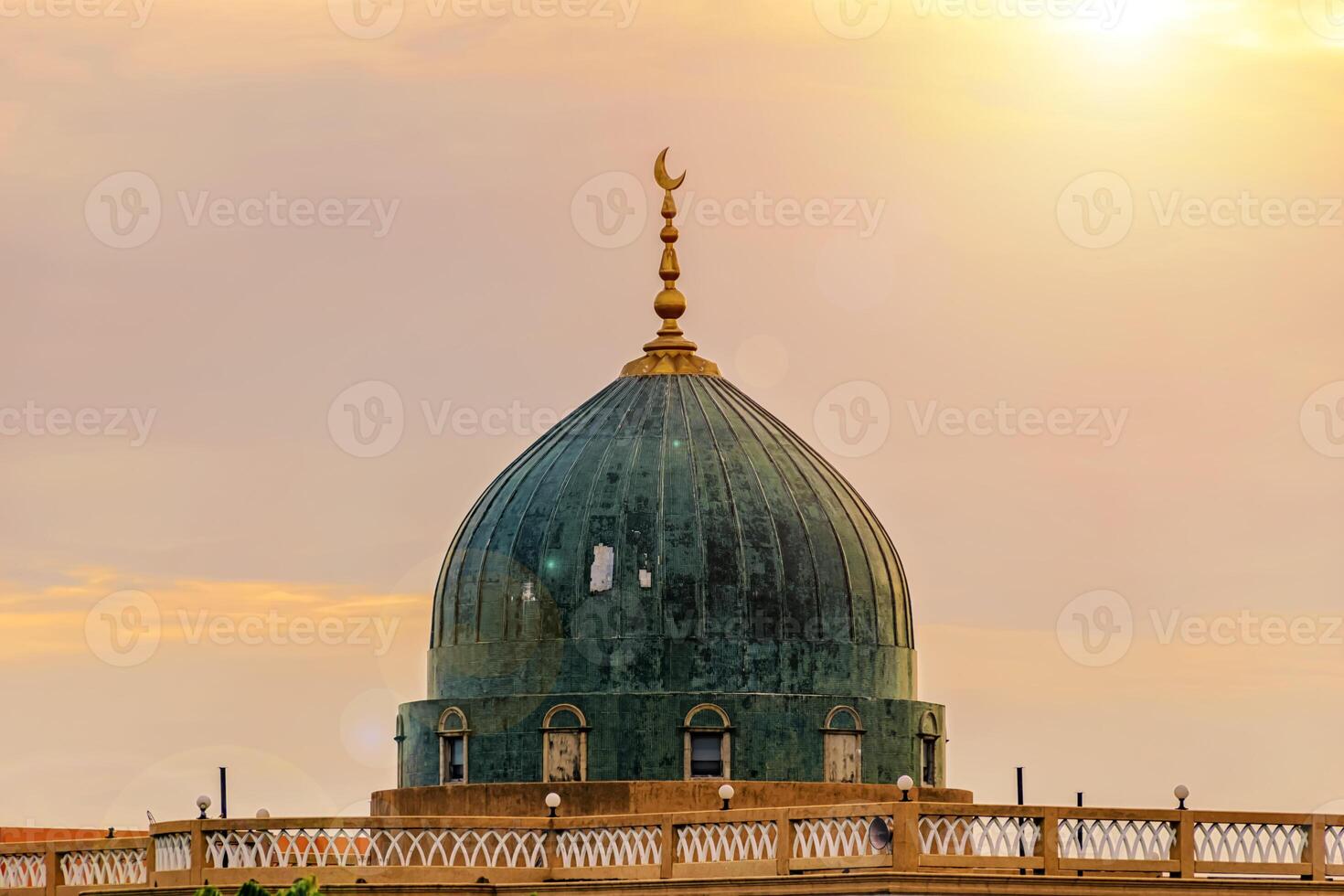The mosque it is an important Islamic place. It is beautiful for the sight in Twilight . photo