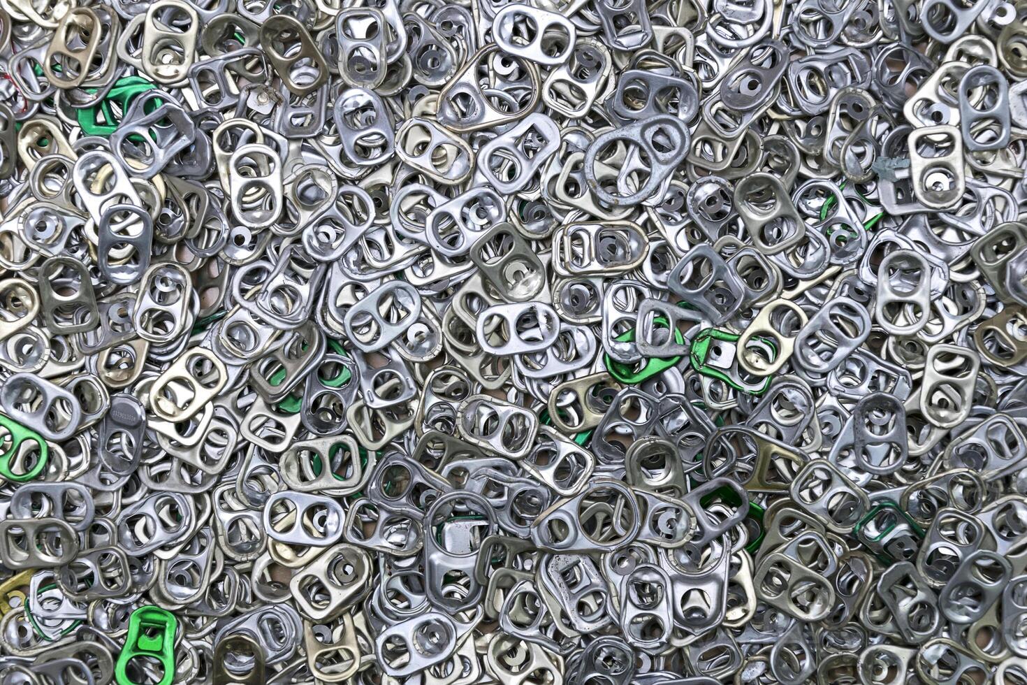 Ring pull tab Aluminum Pop Tops of cans for background photo