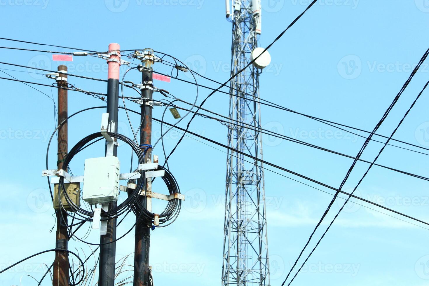 telephone signal catcher tower with a beautiful sky background photo