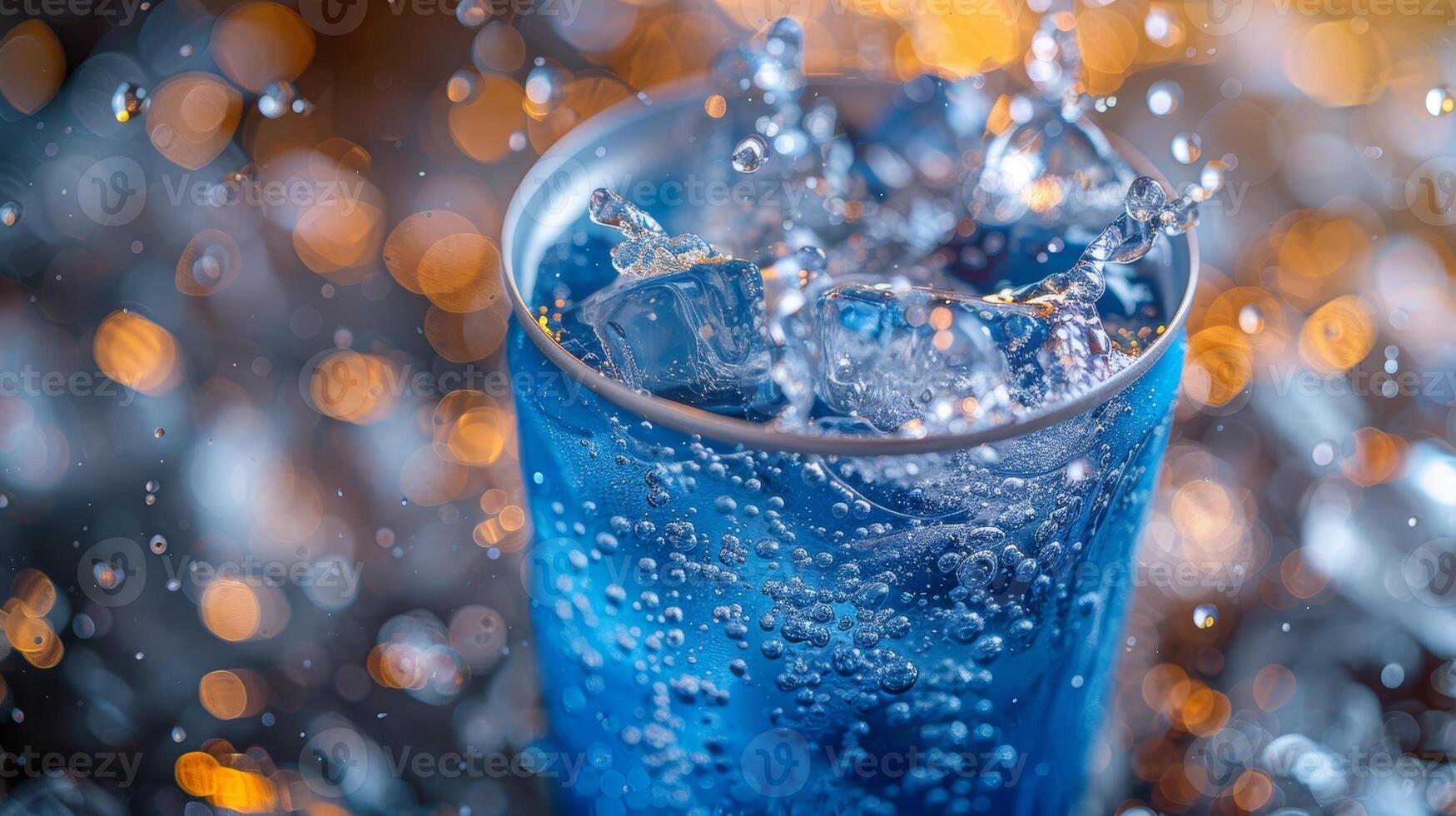 ice cubes splashing into a glass of water on a dark background photo