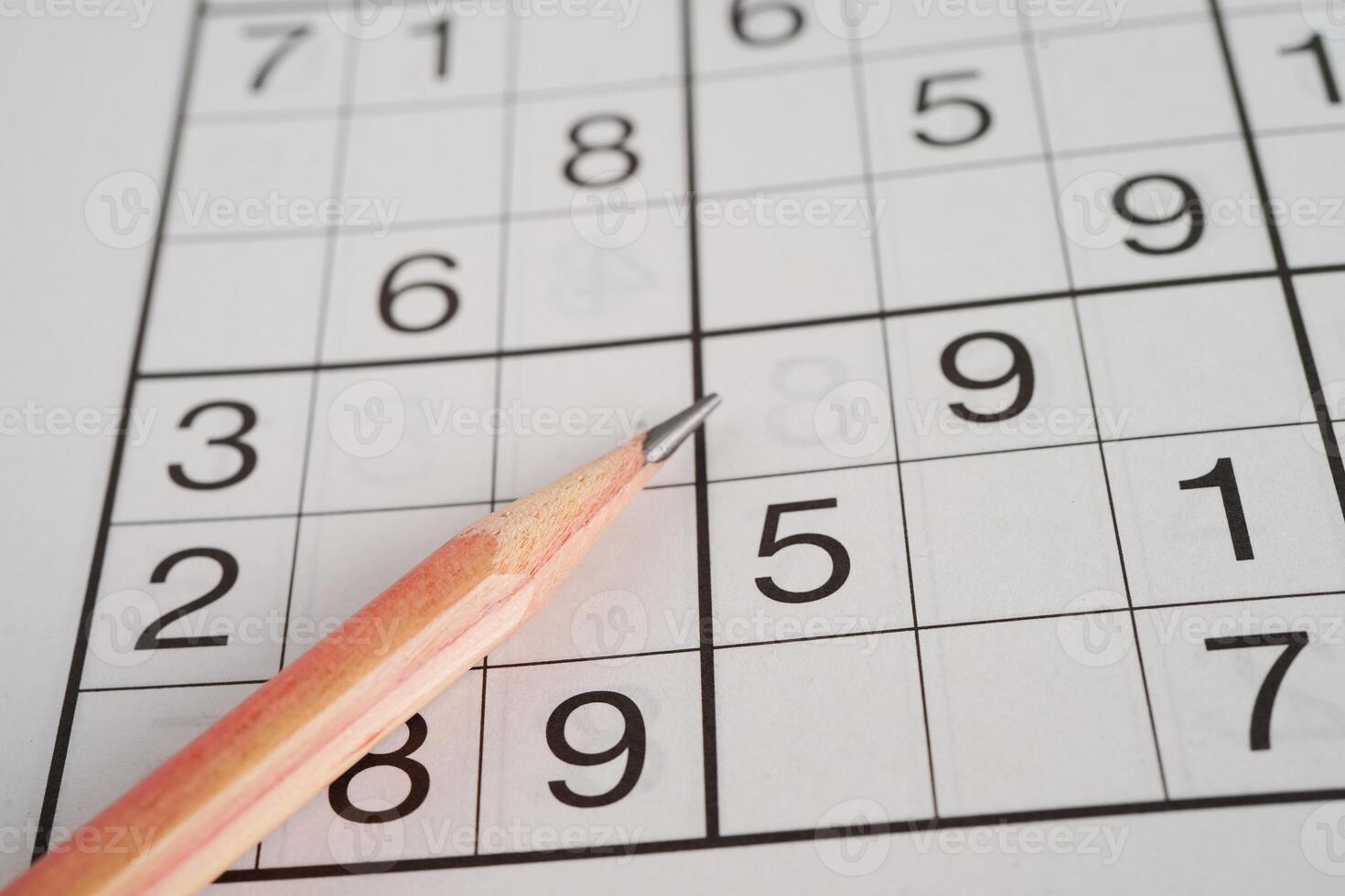 Sudoku puzzle, game to play for keep you brain younger for developing Alzheimer disease in senior patient. photo