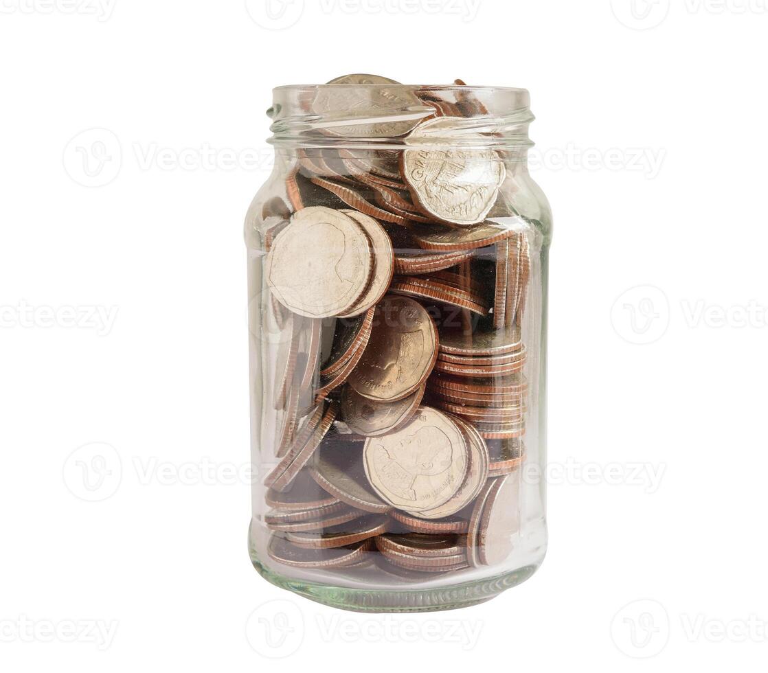 Coins in glass jar isolated on white background with clipping path, Business finance saving money banking investment concept. photo