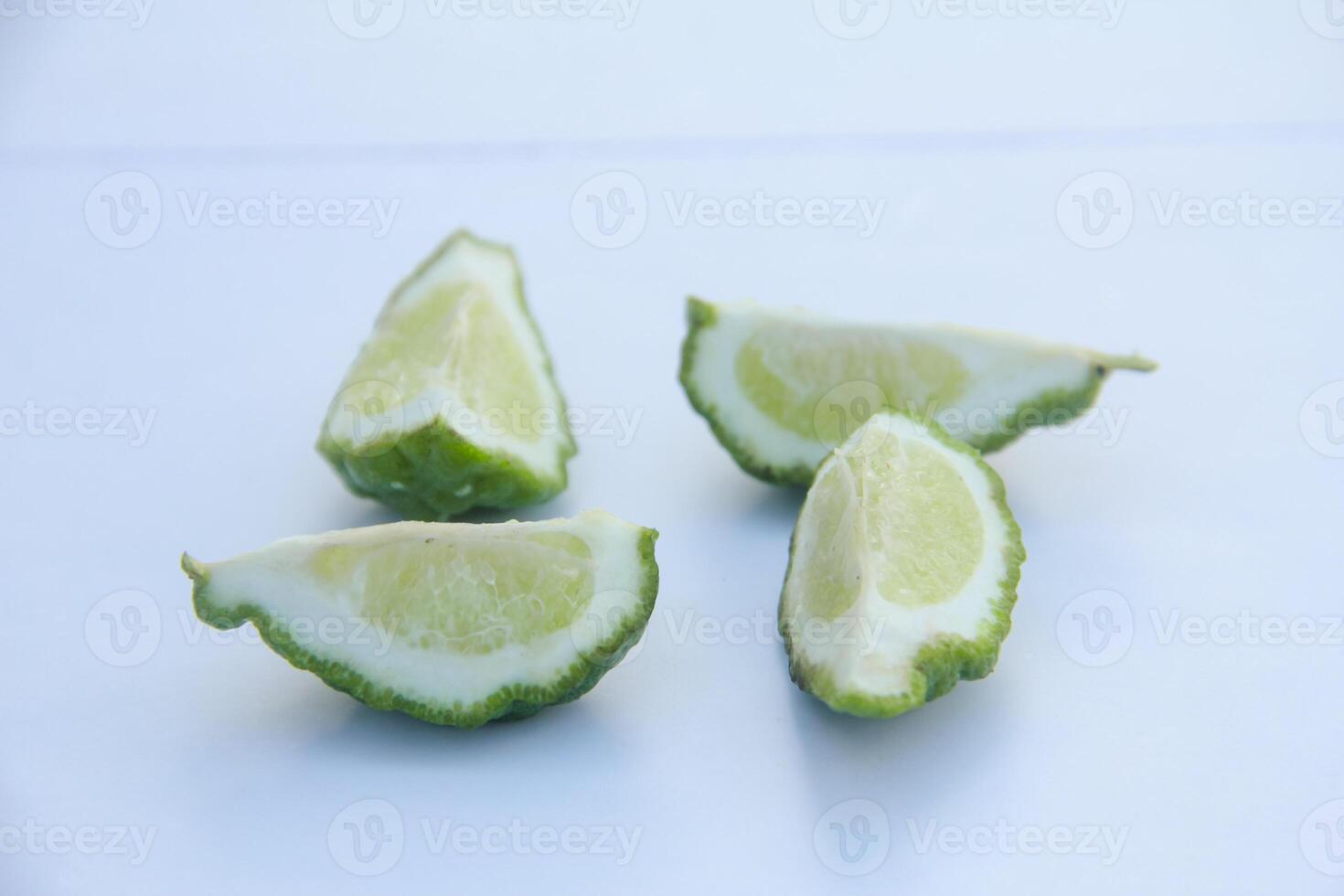 Bergamot fruits or kaffir lime fruit isolated on white background photo