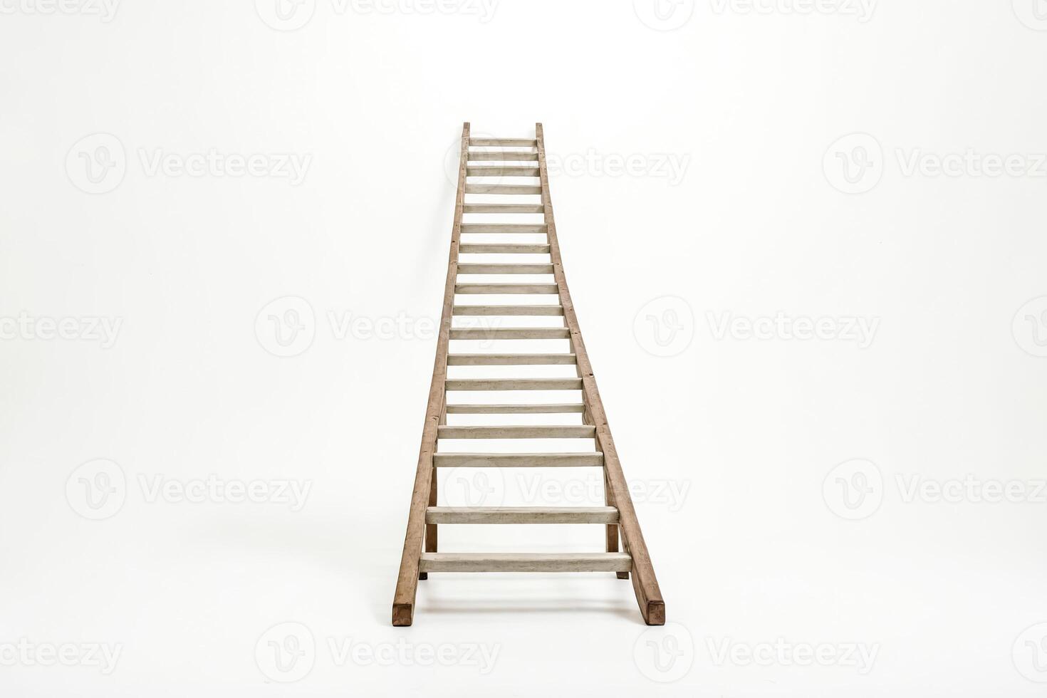 Wooden Ladder on White Background photo