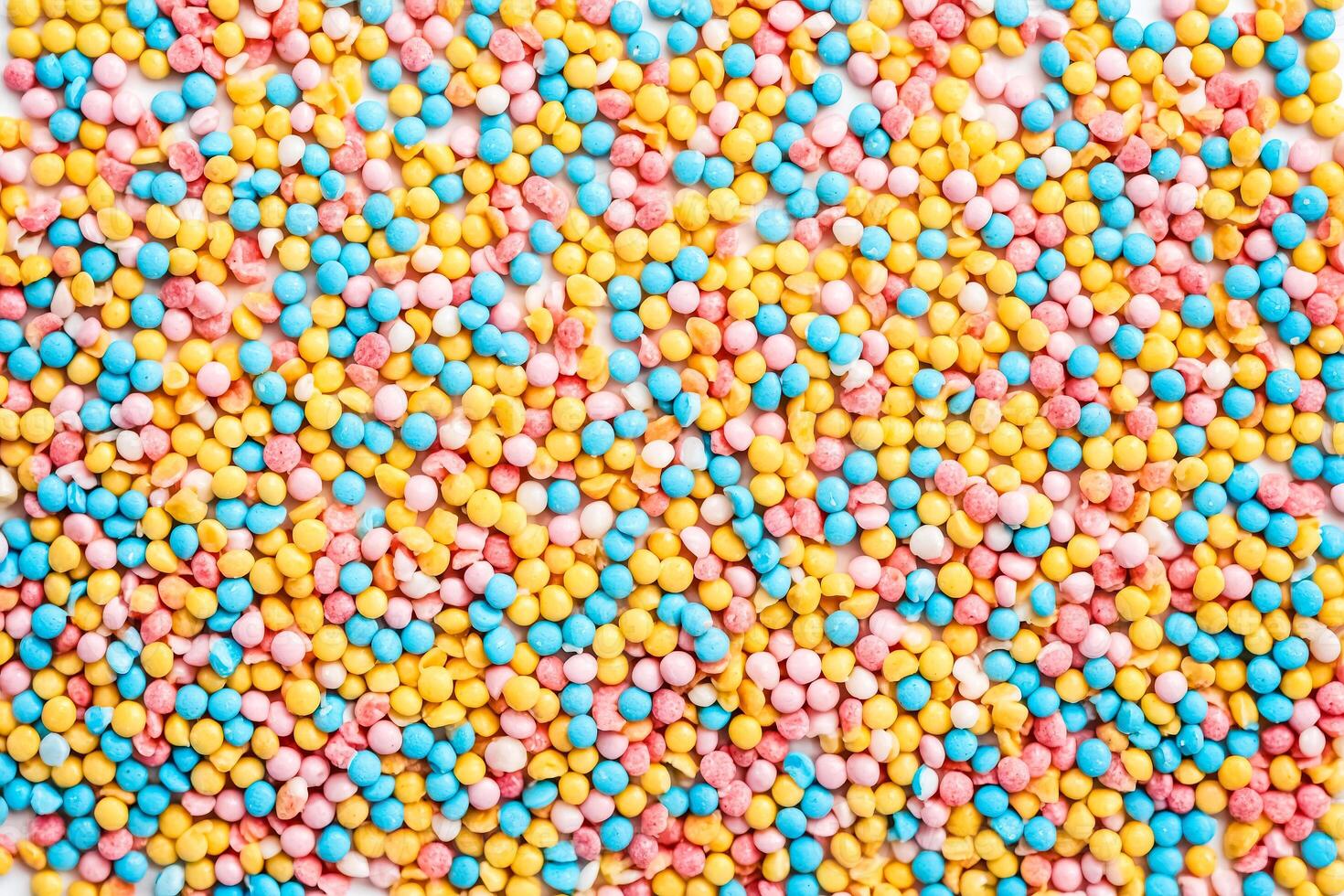 Colorful Sprinkles on white background photo
