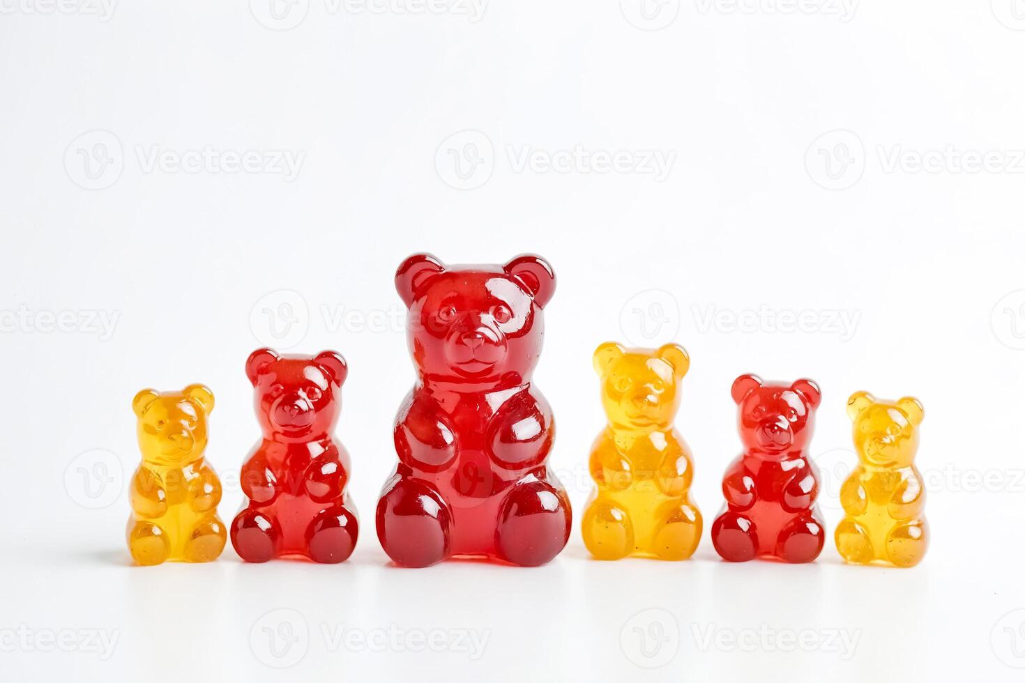 Red and Yellow Gummy Bears in a Row photo