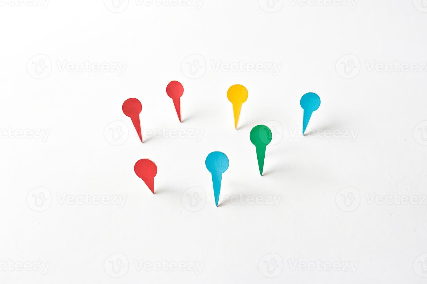 Colorful Paper Pins on White Background photo