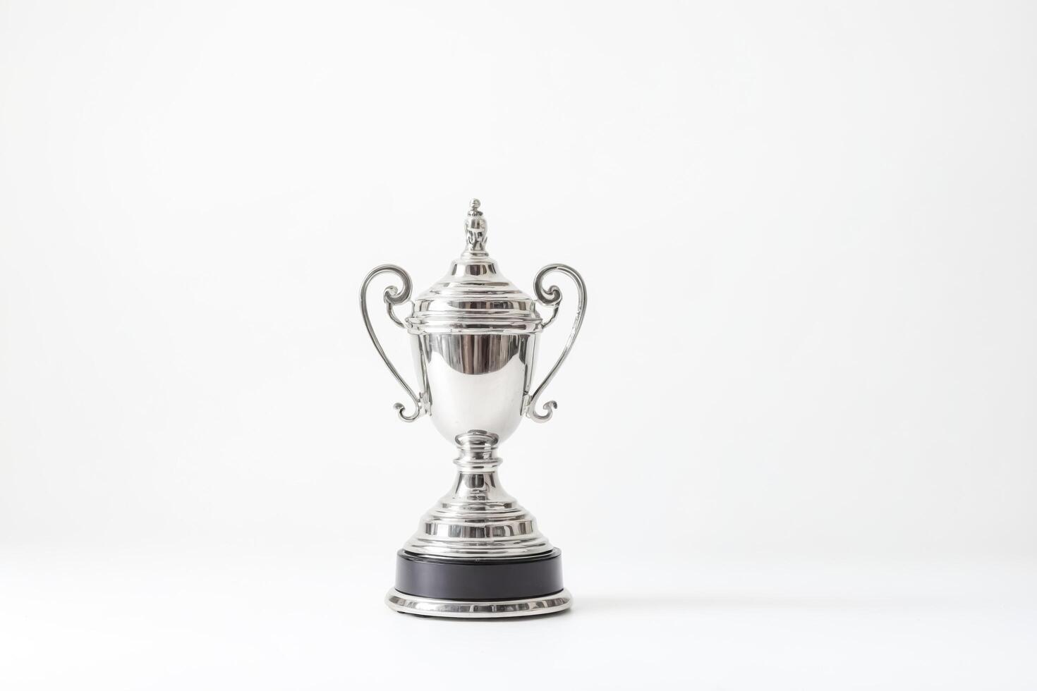 Silver trophy cup on white background photo