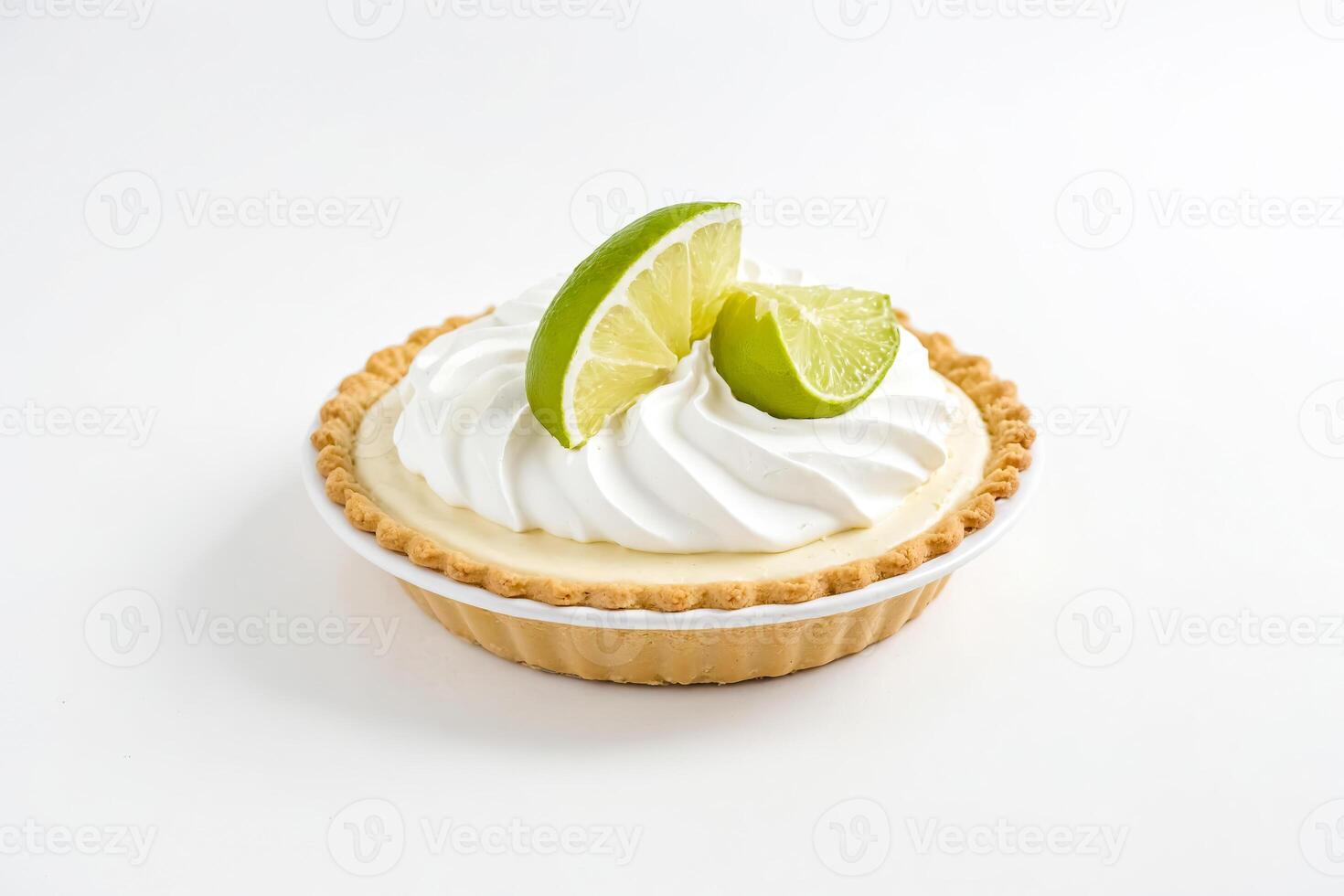 Key Lime Pie with Whipped Cream and Lime Slices photo