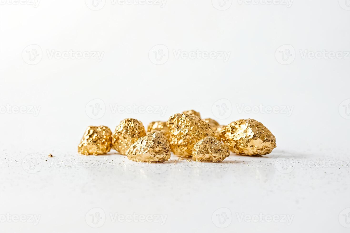 Golden Nuggets on White Background photo