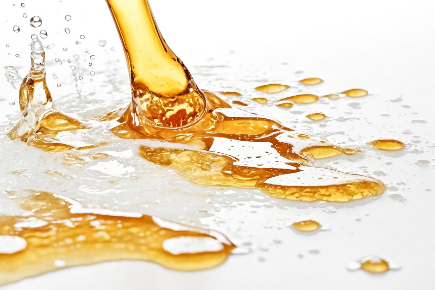 Golden liquid splash on white background photo