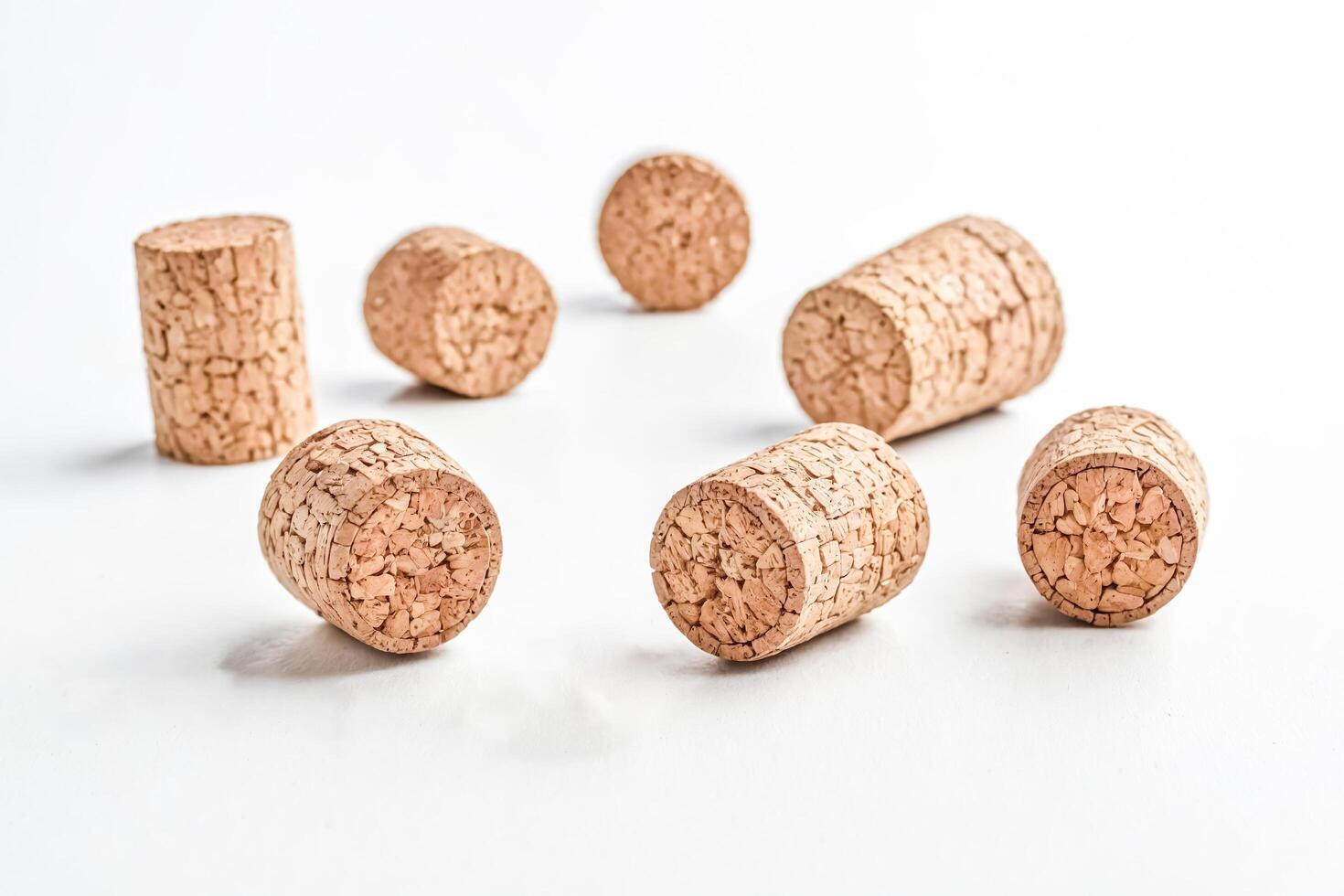 Close Up of Wine Corks on White Background photo
