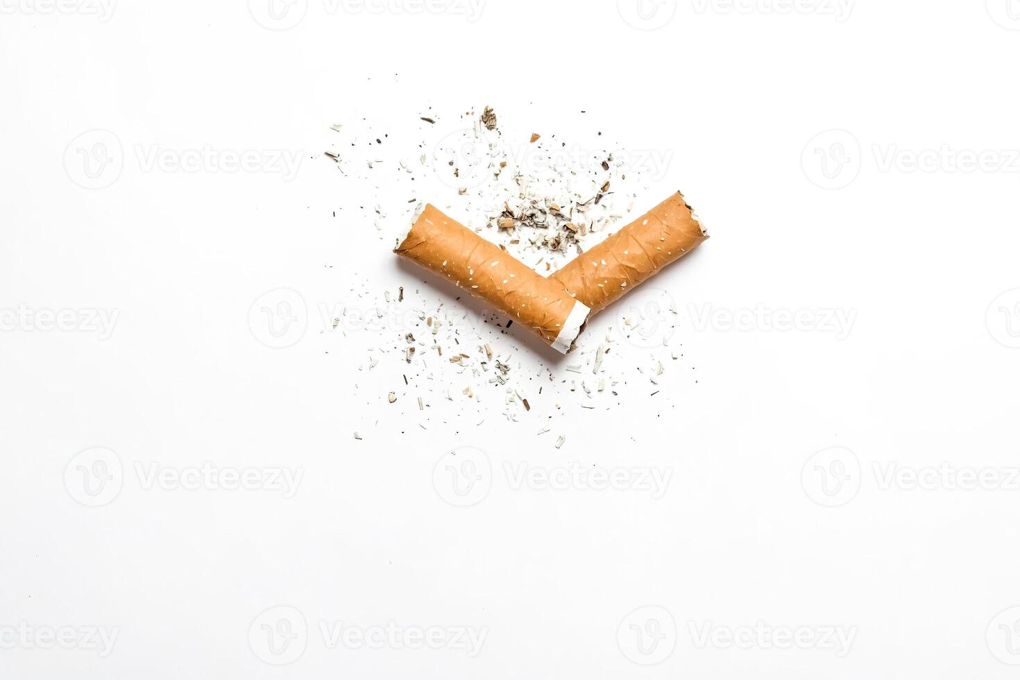 Broken Cigarette on white background photo