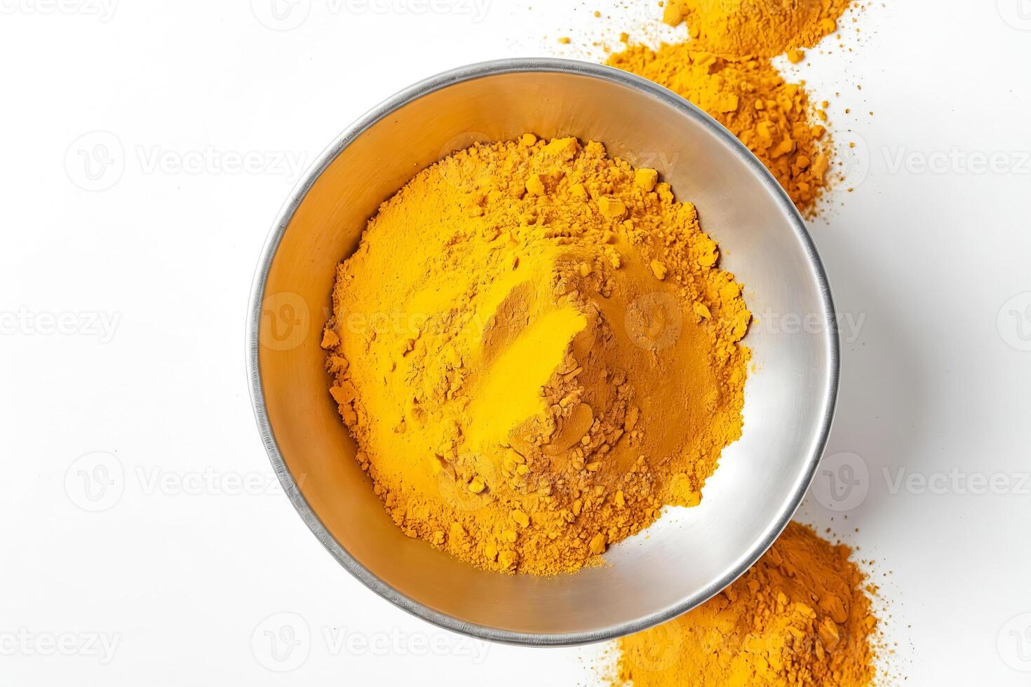 Close Up of Turmeric Powder in a Bowl photo