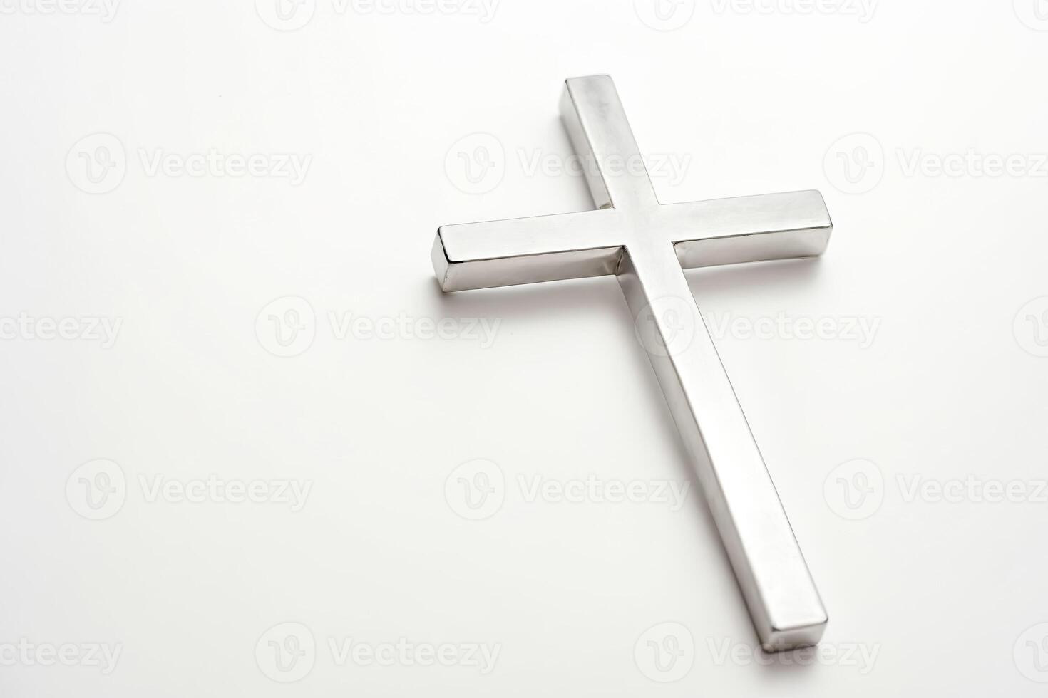 Silver Cross on White Background photo