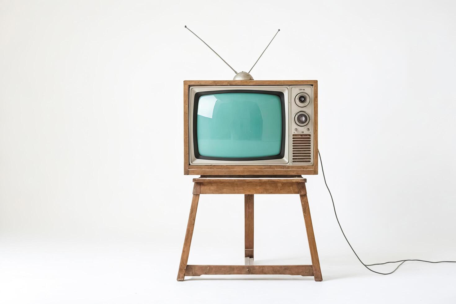 Vintage Television on Wooden Stand photo